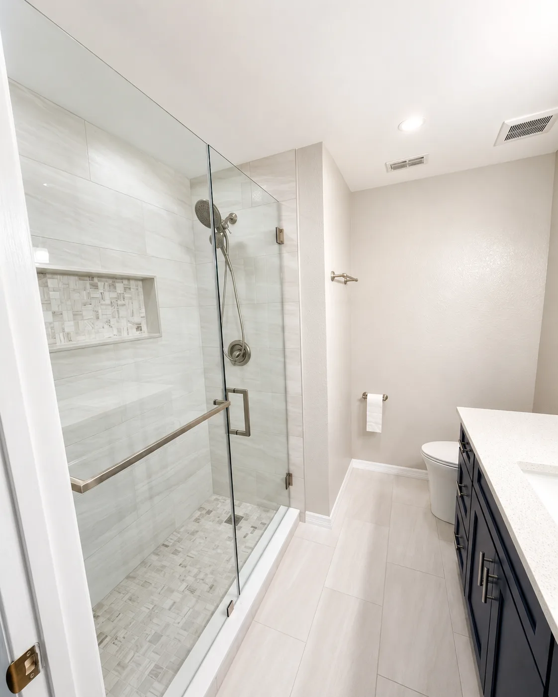 Custom tiled shower and vanity in a Central Florida bathroom remodel