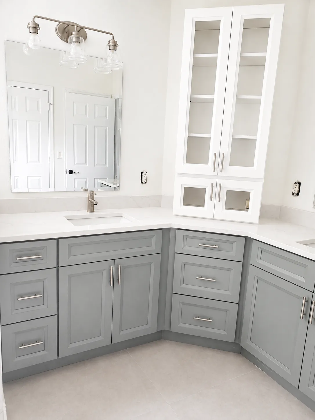 Modern bathroom vanity and fixtures installed by Remoluxe USA